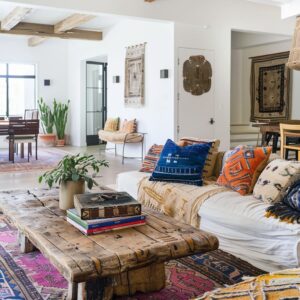 Family photos and heirlooms personalize this bohemian style room