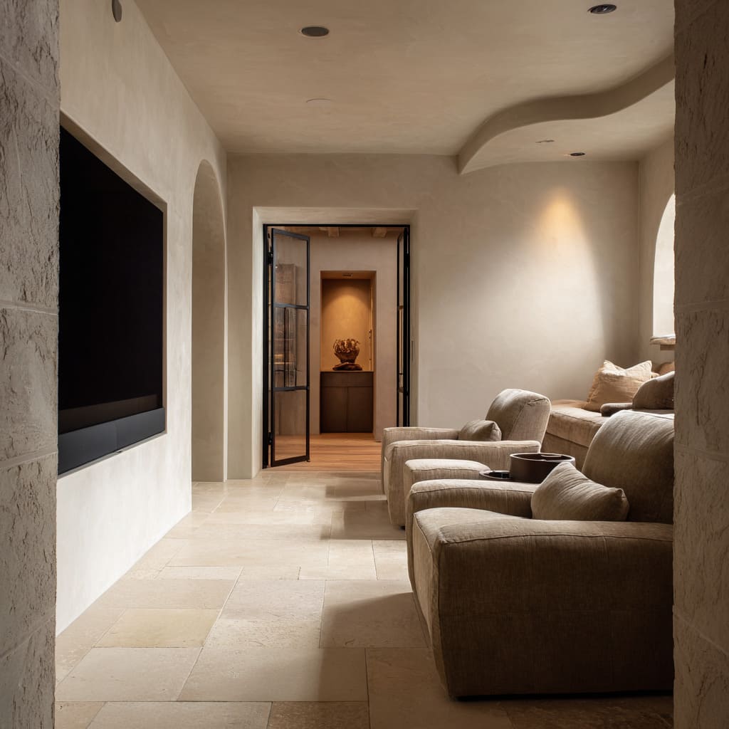 The main seating area is layered by level two curved plush recliners in front and a raised bench-style seat in the back The main seating area is layered by level two curved plush recliners in front and a raised bench-style seat in the back