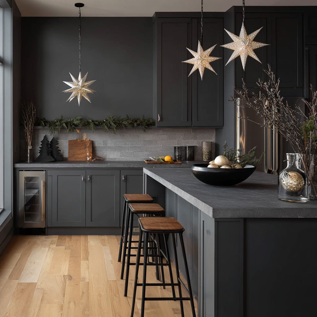 A dark kitchen styled with sculptural pendant stars and moody festive touches A dark kitchen styled with sculptural pendant stars and moody festive touches