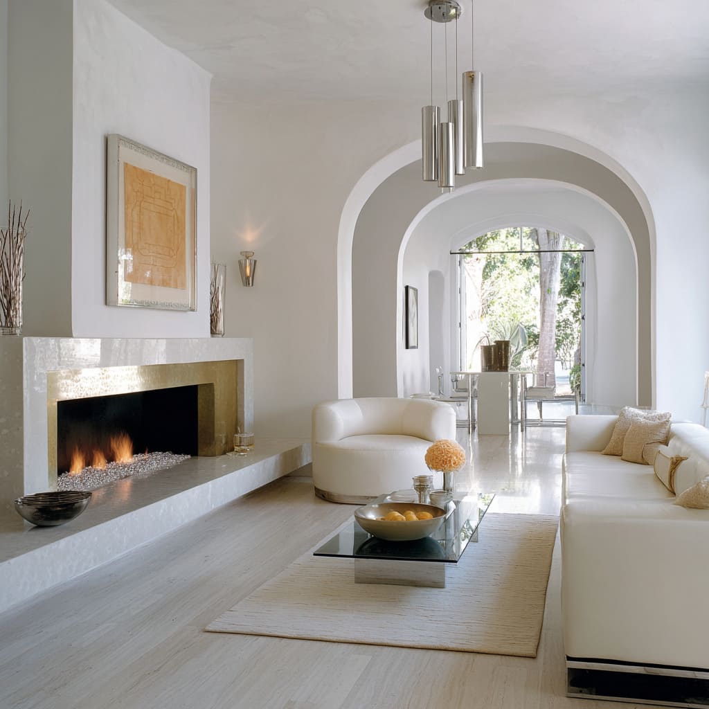 Soft modern silver and gold living room design with pearly hammered metal fireplace, champagne brass firebox Soft modern silver and gold living room design with pearly hammered metal fireplace, champagne brass firebox