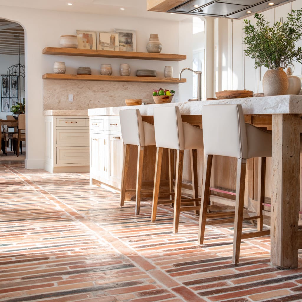 Striped brick terracotta floor concept with chunky oak island and creamy stone tops Striped brick terracotta floor concept with chunky oak island and creamy stone tops