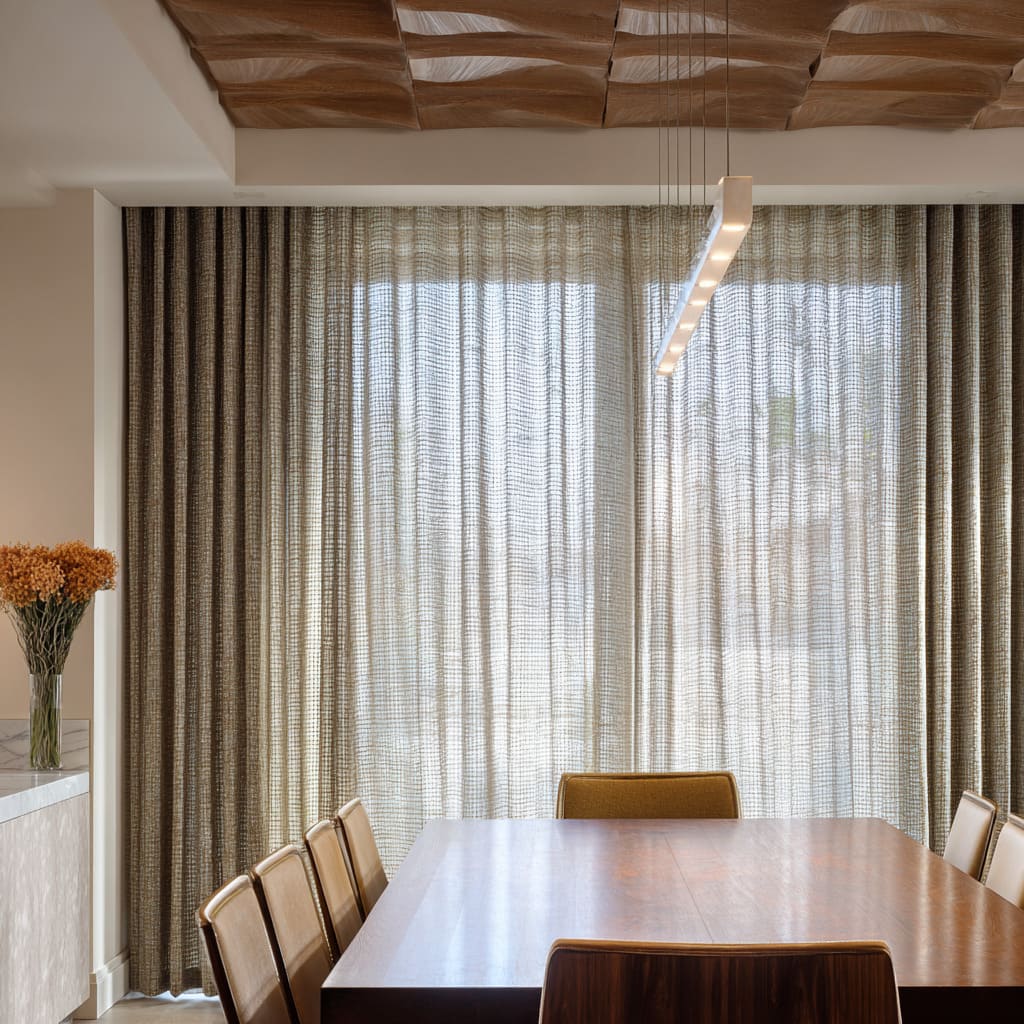 Grid-weave textured sheer filtering daylight on a dining wall concept Grid-weave textured sheer filtering daylight on a dining wall concept