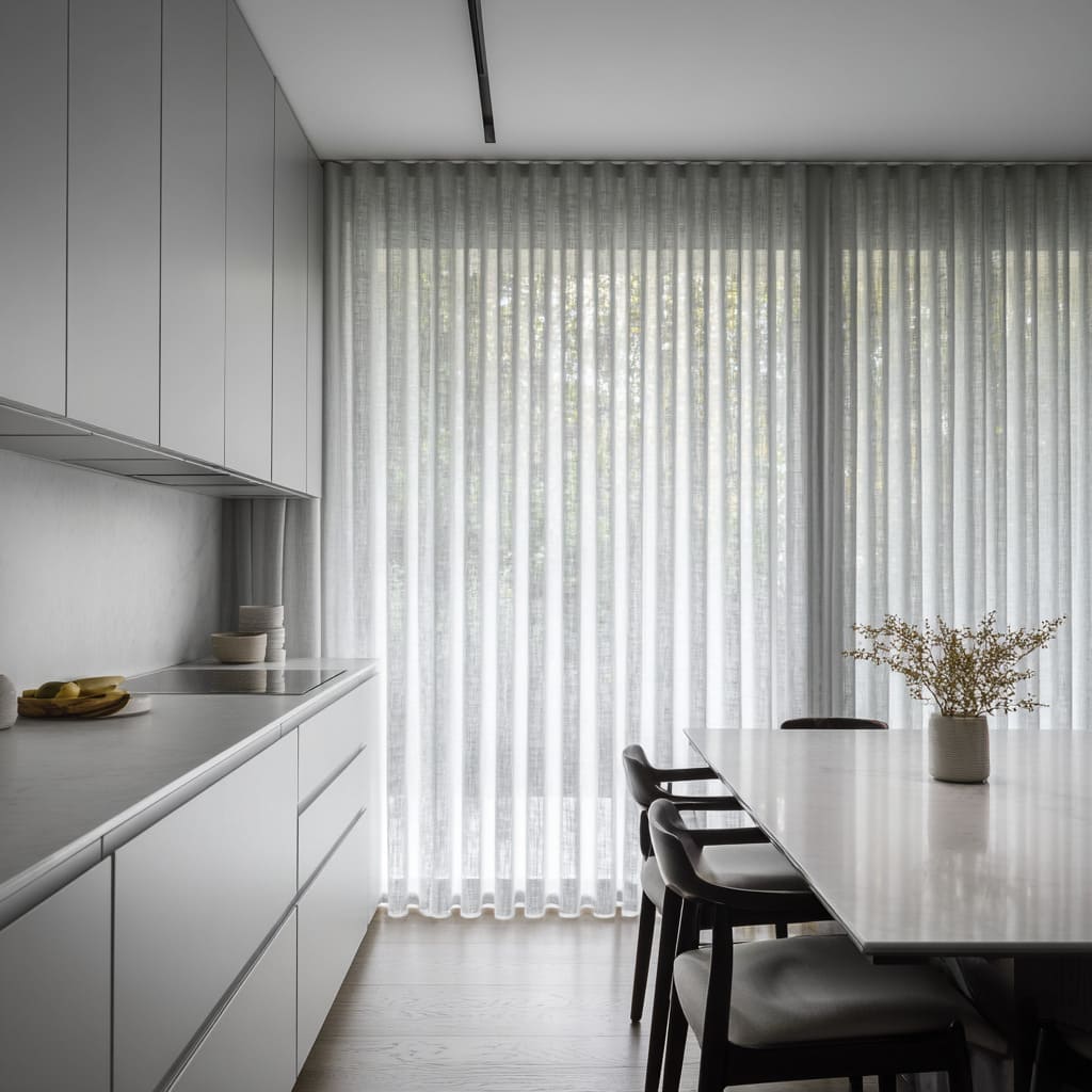 Minimal sheer screen that turns the entire end wall into light Minimal sheer screen that turns the entire end wall into light