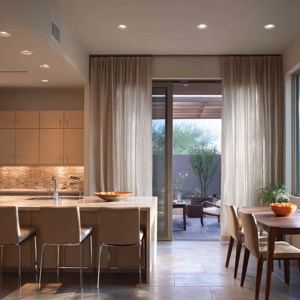 The sliding door curtains ideas here behave like a calm, full-height soft wall that completes the end of the kitchen The sliding door curtains ideas here behave like a calm, full-height soft wall that completes the end of the kitchen