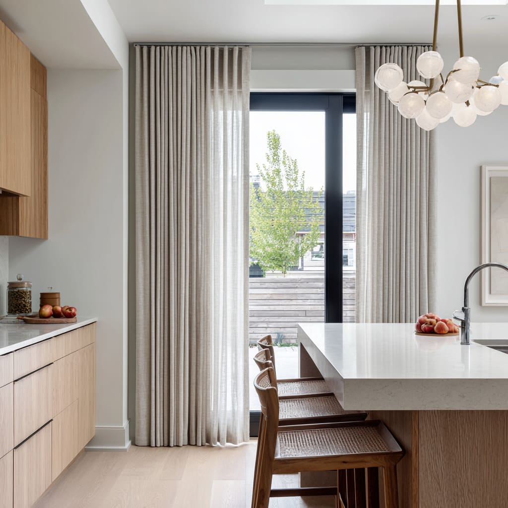 pleat greige drapes creating soft columns at the slider pleat greige drapes creating soft columns at the slider